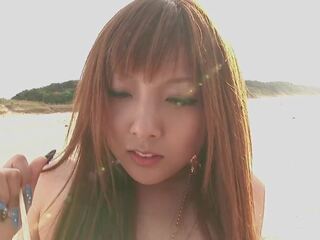 Insanely Hairy Japanese Gyaru in Revealing Swiimsuit Engages in Risky Antics Outdoors Right by the Beach